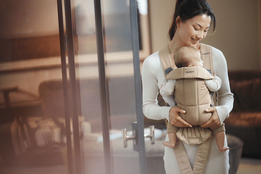 Babydrager babybjorn, voordelen, hoe dragen